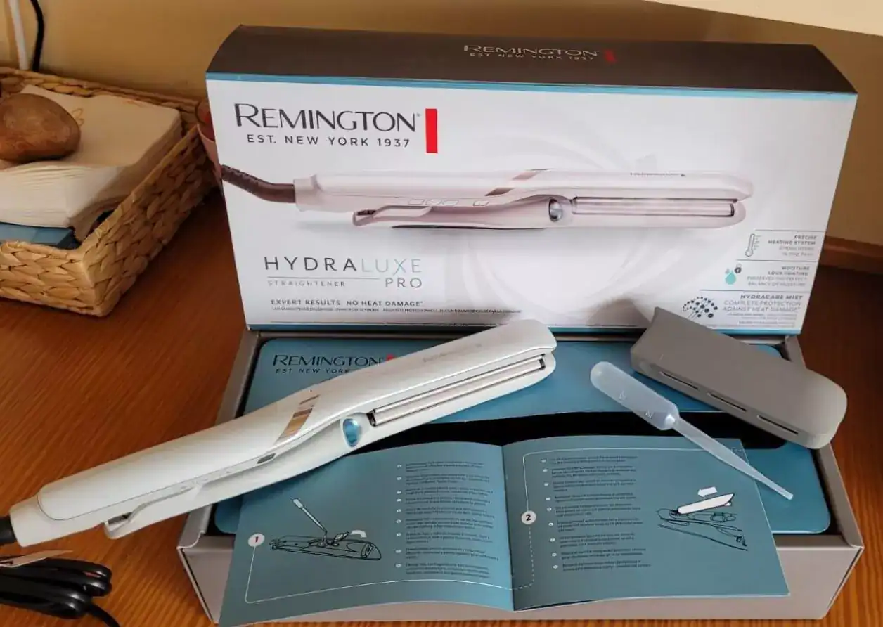 2-hydraluxe-pro-s9001-1-65f34a877c012 Plancha de pelo Remington HydraLuxe Pro en caja abierta.