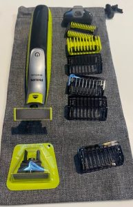 Kit de afeitadora eléctrica con accesorios para un corte preciso y cómodo.